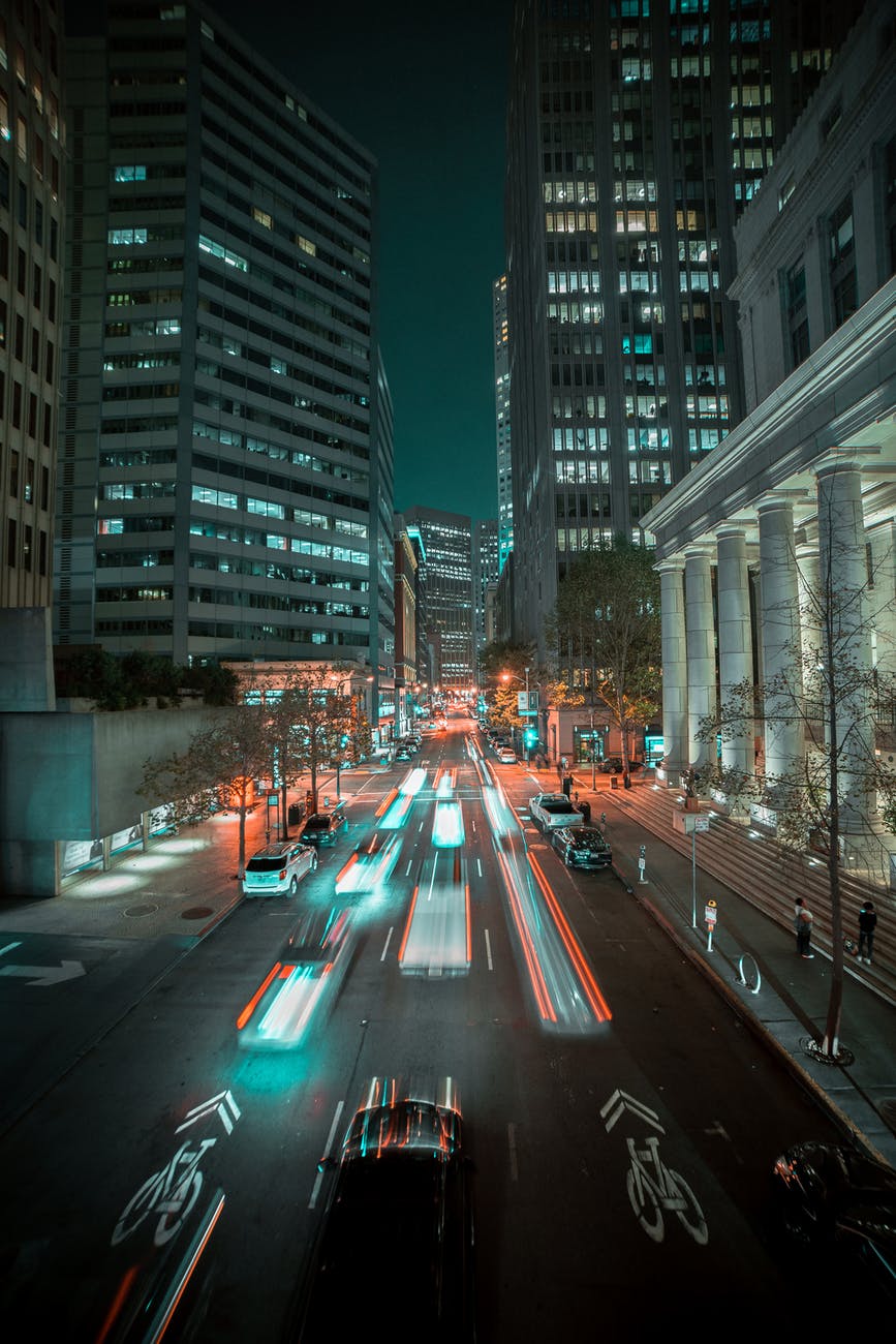 cars on road in city during night time